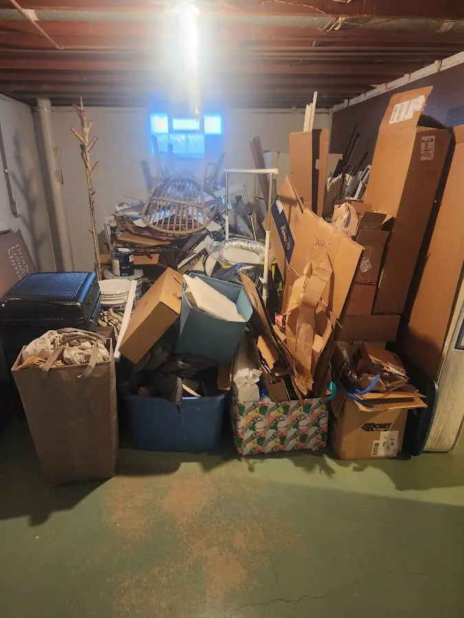 Roll-off dumpster container at job site for 2 Yard Dumpster Rental in Moores Mill